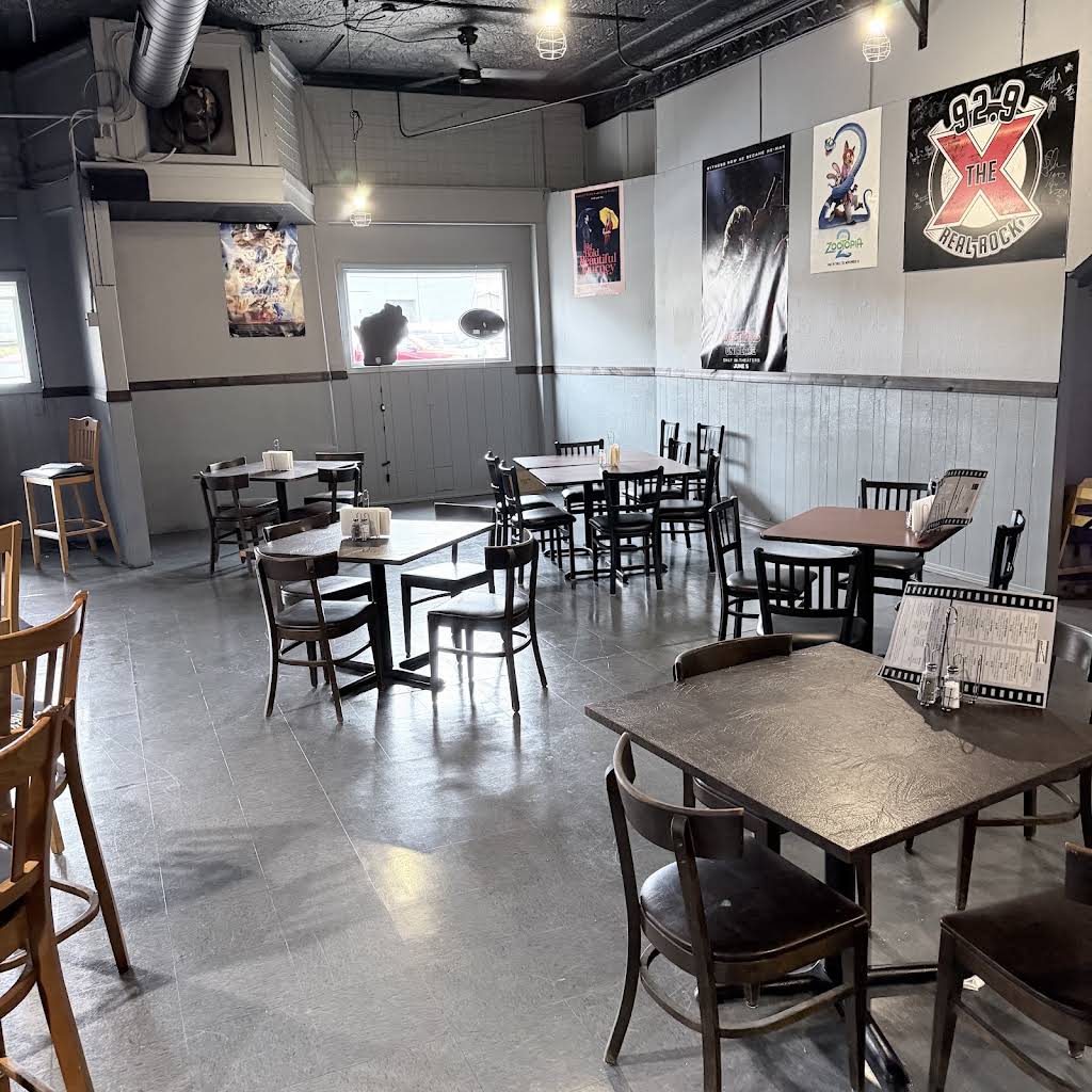 Tables and chairs in the movie-themed dining room at That's a Wrap